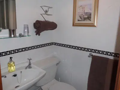 a bathroom with a toilet and a sink at The Elms in East Harling