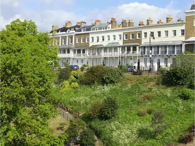 a row of large white buildings in a city at Hamiltons Boutique Hotel in Southend-on-Sea