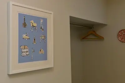 a picture of someones closet with a bunch of earrings at 10A Ruston Chambers Free parking, Luxury 2 bedroom city center apartment in St Ives