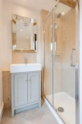a bathroom with a white sink and a shower at 1 Bed in Halesworth oc-bbb in Bramfield