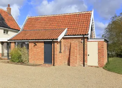a brick house with an orange roof at 1 Bed in Ipswich oc-spha in Harkstead