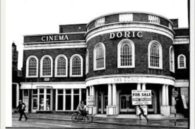a black and white photo of a building at 13 The Grosvenor, luxury flat, central Newmarket, in Newmarket