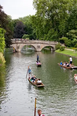 a group of people in boats on a river at 2 Bedroom City Centre Townhouse - with Parking in Cambridge