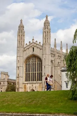 a couple standing in front of a castle at 2 Bedroom City Centre Townhouse - with Parking in Cambridge