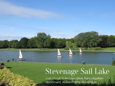 a group of sailboats on the water in a park at Skyvillion-STEVENAGE Amazing 3Bed House, Garden, Free Off Street Parking for 2 Cars, WiFi in Stevenage