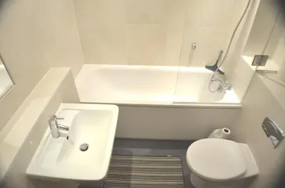 a small bathroom with a sink and a toilet at 360 Serviced Accommodations - Brentwood 2 Bedroom Executive Apartment with Secure Parking in Brentwood