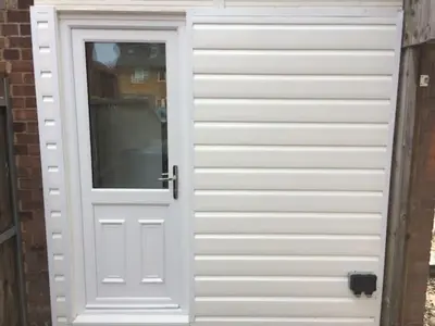 a white door with a window on a building at Independent two bed en-suite annex, close to city in Cambridge