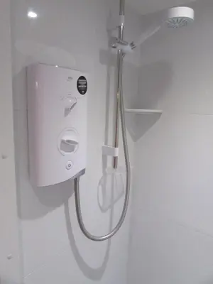 a shower in a bathroom with a shower at Independent two bed en-suite annex, close to city in Cambridge