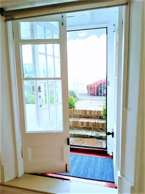 an open door in a room with an open door sidx sidx at Beachfront Studio Apartment in Felixstowe