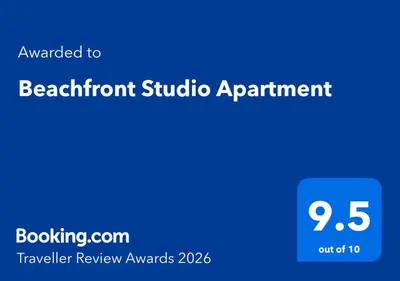 a blue sign with the words bathroom subaru appointment at Beachfront Studio Apartment in Felixstowe
