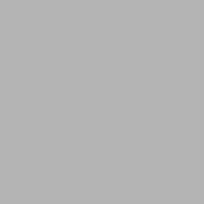 a courtyard with benches in front of a building at Novotel Cambridge North in Cambridge
