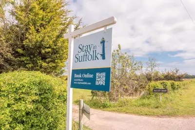 a sign for a stayatown study on a roadroute at The Stables, Valley Farm, Snape in Saxmundham