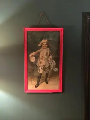 a painting of a little girl hanging on a wall at Comfortable Room or Whole House - 4BR 1BATH 1TOILET at Suffolk Pink House, Newmarket in Newmarket