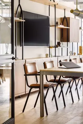 a dining room with a table and chairs at Hyatt Centric Cambridge in Cambridge