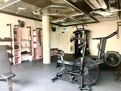 a room with a gym with a bike and a treadmill at Hyatt Centric Cambridge in Cambridge