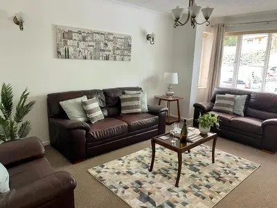 a living room with two couches and a coffee table at Number 15 in Norwich