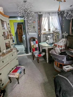 a room with a table and chairs and a table and a room with a table at Quaint & Quirky House Colchester Town Centre in Colchester