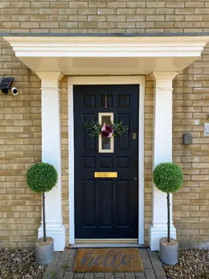a black front door with a wreath on it at Modern Spacious Flat In Ipswich - Sleeps 6 - Parking in Freston