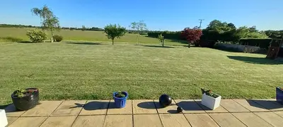 a view of a yard with a field of grass at Barn Farm Guest House in Cold Norton