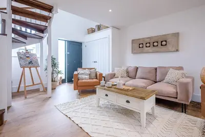 a living room with a couch and a coffee table at The Art Room, Leiston in Leiston