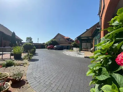 a cobblestone street in a residential neighborhood with houses at Coastal Mews House close to Beach in Felixstowe