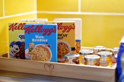 a tray full of cereal andmiloordzos at Modern Luxury 1 bed apartment with parking near Stansted Airport in Stansted Mountfitchet