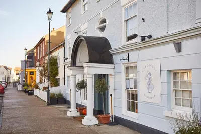 a white building with a doorway on a street at SEALOFT, Aldeburgh , Stay in Suffolk in Aldeburgh