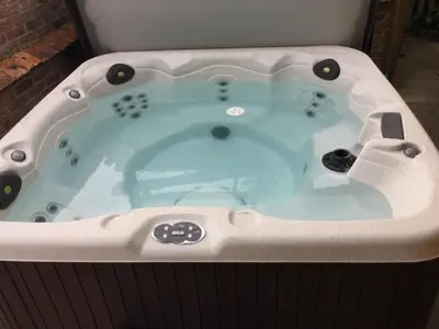 a jacuzzi tub in a room at Lavender Cottage in Thorndon