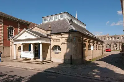 an old building on the side of a street at Meddlars a historic cottage on the countryside edge of a vibrant Market Town in Hadleigh