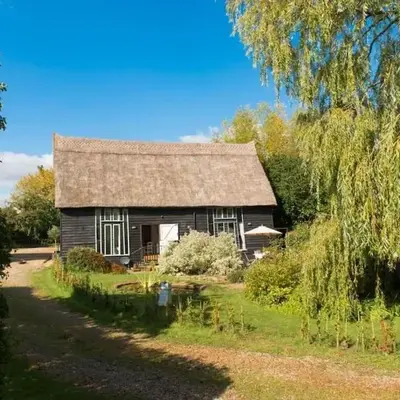 Deepwell Granary is a lovely thatched barn with attached meadow woodland