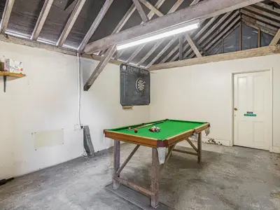 a room with a pool table in it at John Fanner Barn - Uk37102 in Mellis