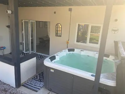 a large bath tub in a room with at •11 The Nook in Wivenhoe