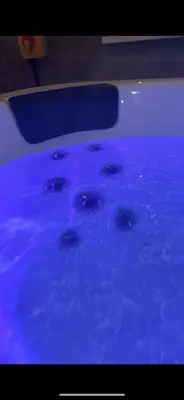 a pool of blue water with bubbles in it at •11 The Nook in Wivenhoe