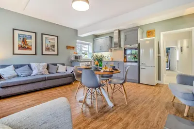 a kitchen and living room with a couch and a table at 2 Bed in Bentley oc-thpo in Bentley