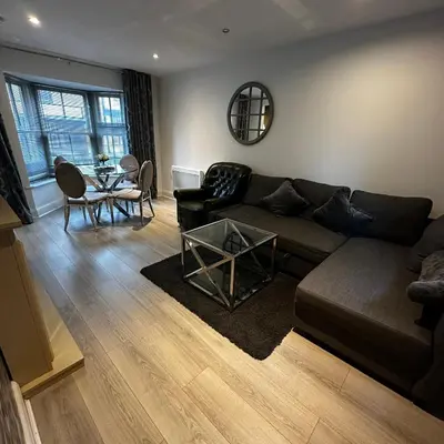 a living room with a couch and a table at One Bedroom Flat Town Centre Colchester in Colchester