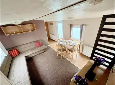 an overhead view of a living room with a table at La Casa Greenaway in Jaywick Sands