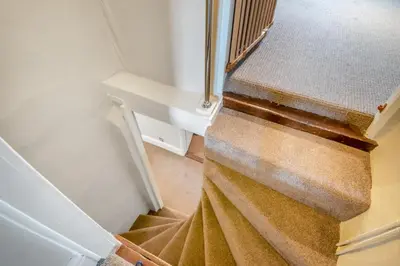 a winding stairway with a dust at 5 Bed in Bramfield oc-sftmh in Bramfield