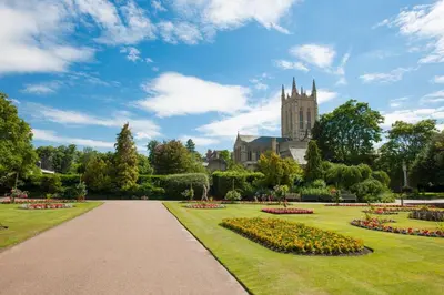 a view of a park with a cathedral in the background at 1 Bed in Great Waldingfield oc-ac1 in Great Waldingfield