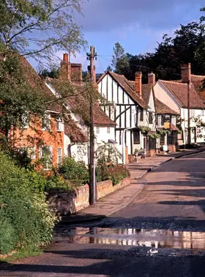 a row of houses on the side of a street at 2 Bed in Great Waldingfield oc-ac3 in Great Waldingfield