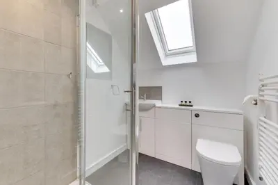 a bathroom with a shower and a toilet and a sink at 2 Bed in Great Waldingfield oc-ac3 in Great Waldingfield