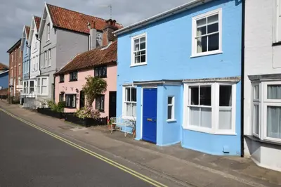 a blue house on the side of a street at Seaflower, Aldeburgh in Aldeburgh