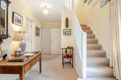 a home office with a desk and stairs at 3 Bed in Aldeburgh oc-spcot in Aldeburgh