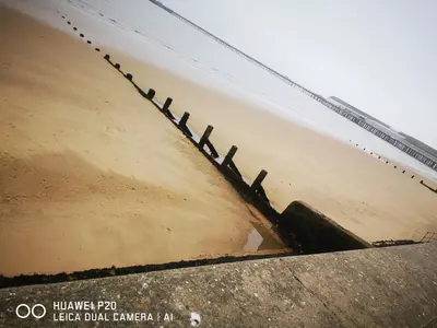 a pile of sand on the side of a beach at Lovely 2-Bed caravan in Walton on the Naze in Walton-on-the-Naze