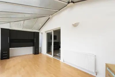 an empty room with white walls and a ceiling at Skyvillion - STEVENAGE SPACIOUS & COZY 3Bed House with Parking, Wifi, Garden in Aston End
