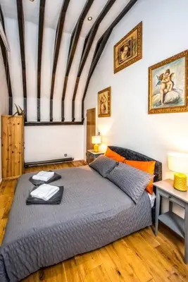 a bedroom with a large bed in a room at Beautiful grade II listed 4 bed Victorian Conversion - Billericay Essex in Billericay