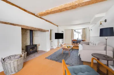 a living room with a couch and a fireplace at 2 Bed in Halesworth oc-7lr in Halesworth