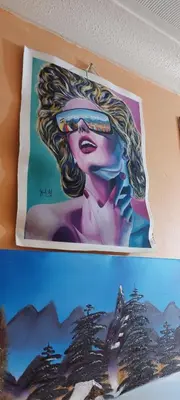 a painting of a woman on a wall at Basildon House of Muralist in Basildon