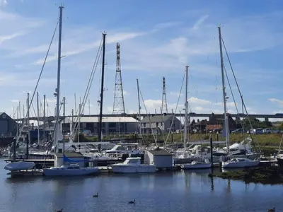 a bunch of boats docked in a harbor at Modern 3 Bedroom Town House in Ipswich