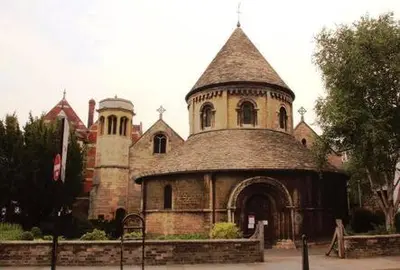 an old building with a tower and a church at Charming 1 bed super central Terraced House in Cambridge