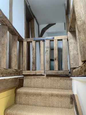 a set of stairs leading up to a balcony at Blythe Cottage in Long Melford